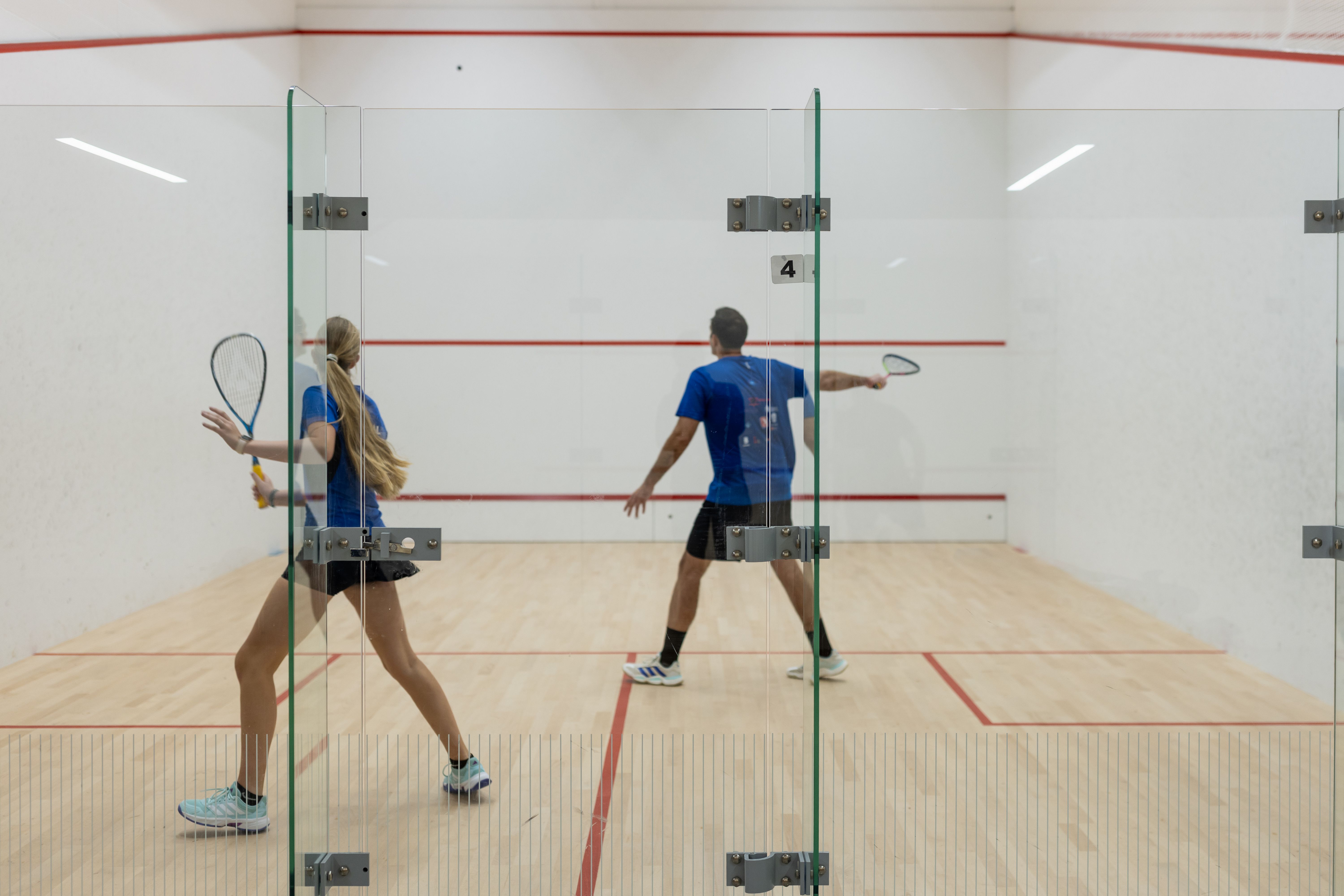 Members playing squash at Winchester College Sports Centre